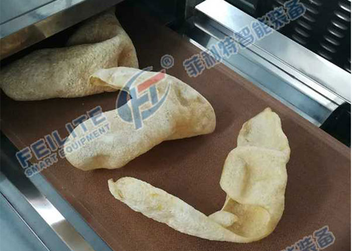 豬皮膨化微波烘干燥設(shè)備成功交付，非油炸更健康
